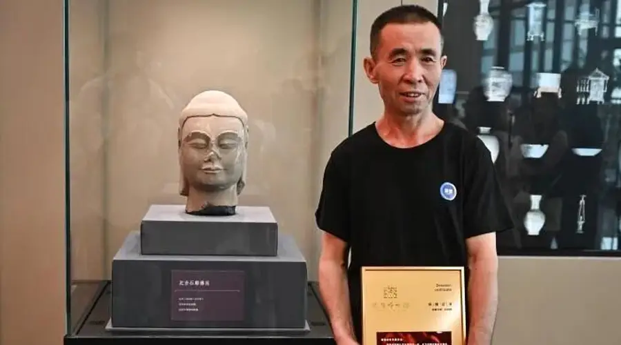 山西村民挖出1400年前佛首,身首合璧获奖励万元