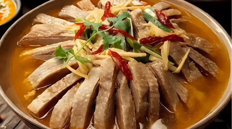 吕文扬:把一锅固始鹅块熬成浸满乡土的老风味