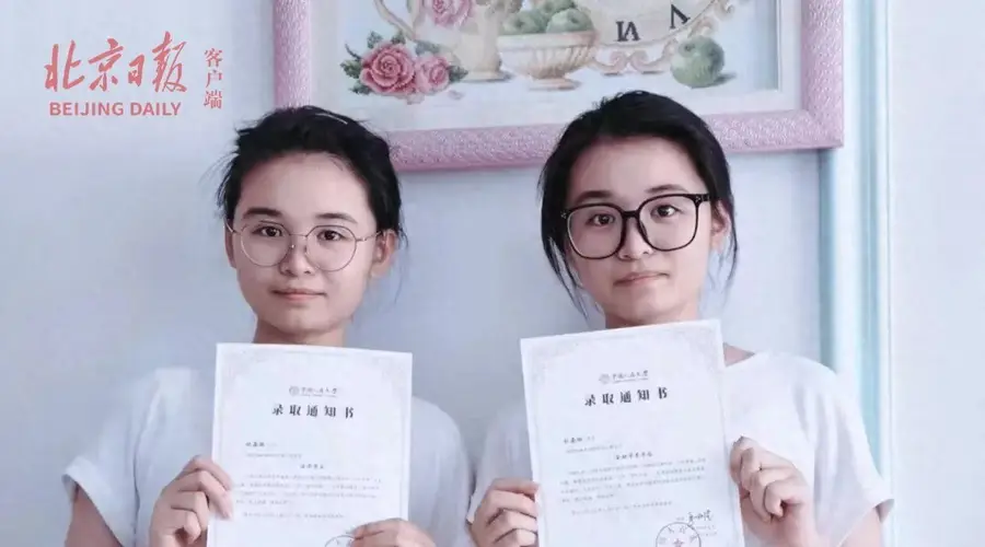 江西双胞胎同获660分 双双圆梦中国人民大学